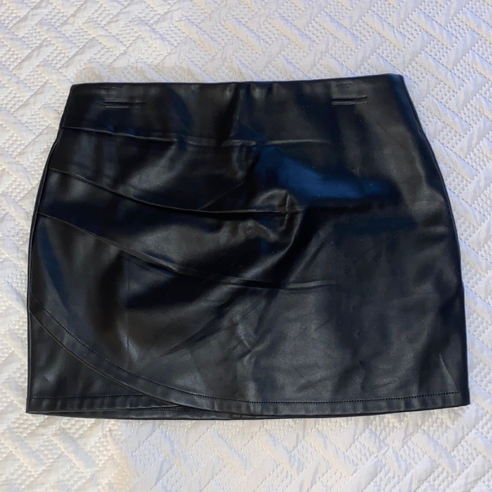 Black leather mini skirt